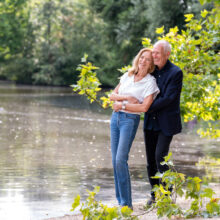 Travel portrait of couple by a pond in Vondelpark in Amsterdam — visiting travellers shoot