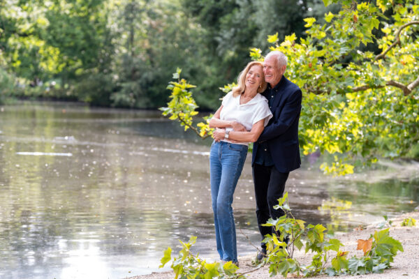 Travel portrait of couple by a Vondelpark pond, Amsterdam — visiting travellers shoot