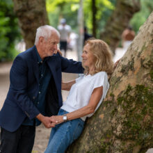 Travel portrait of couple beside a tree in an Vondelpark — visiting travellers shoot