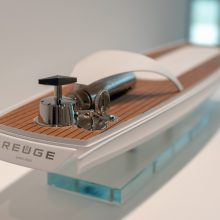 Photoshoot of a music box that looks like a sailship.
